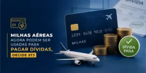 Avião, moedas e cartão de crédito 'MILHAS' com selo 'DÍVIDA PAGA'