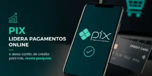 Smartphone com app PIX e cartão de crédito em fundo escuro