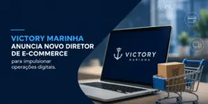 Laptop com logo VICTORY MARINHA e carrinho de compras no escritório